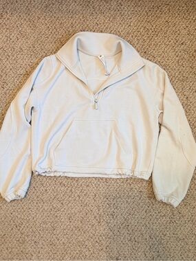 Lululemon Crop Cream Half-Zip Pullover with adjustable hem